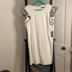 White a line dress with ruffle sleeve